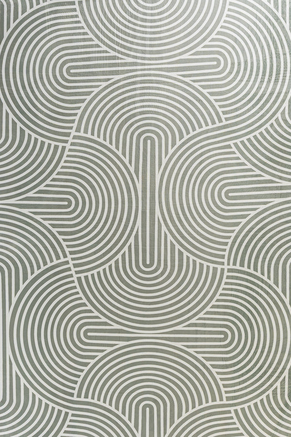 Gray rectangular placemat with a repeating pattern of concentric, arched lines.