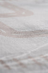 Detailed view of a white sheet with a faint white line, highlighting texture and simplicity.